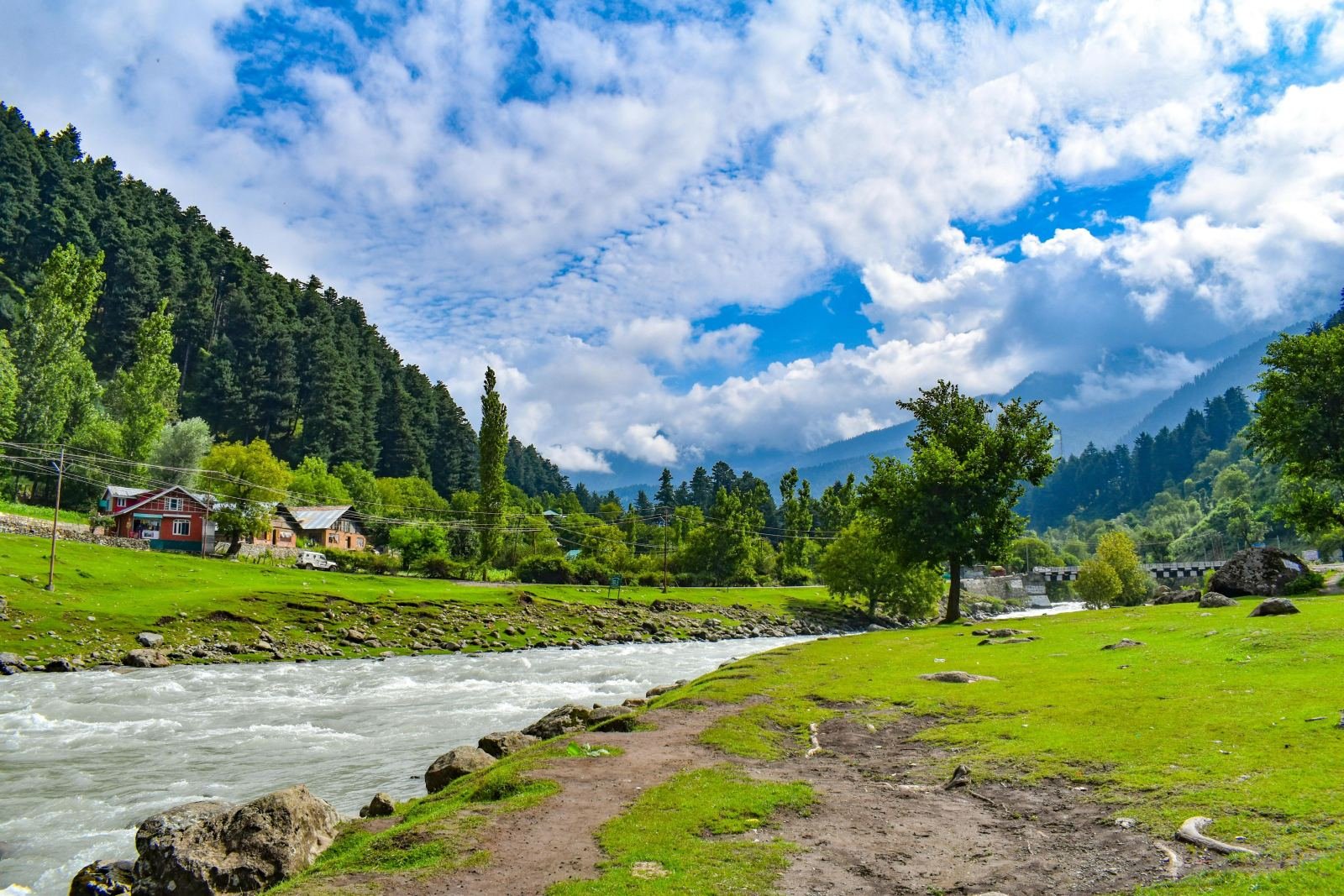 Stream and green meadow at Doodhpathri